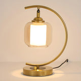 Elegant Golden Curved Clear Glass Shade Table Lamp Image - 7