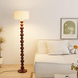 Elegant Pleated Cone Shade Stacked Ball Floor Lamp Image - 2