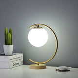 Elegant Simple Glass Globe Curved Metal Table Lamp Image - 11