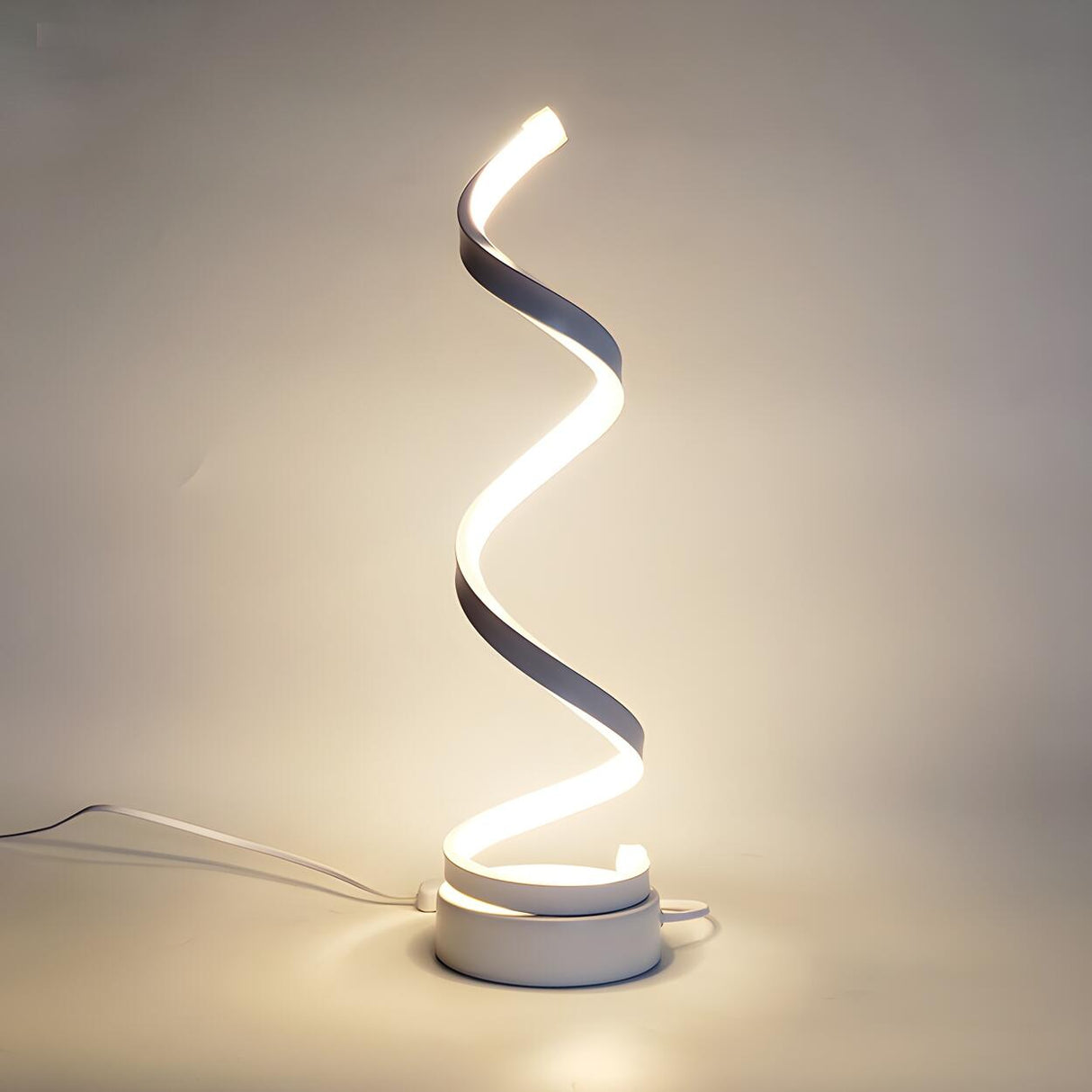 Elegant Simple Spiral Strip Metal Bedroom Table Lamp Image - 2