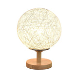 Hand-Woven Rattan Global Shade Wooden Base Table Lamp Image - 11