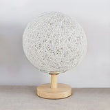 Hand-Woven Rattan Global Shade Wooden Base Table Lamp Image - 15