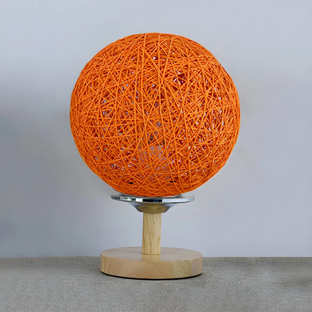 Hand-Woven Rattan Global Shade Wooden Base Table Lamp Image - 5