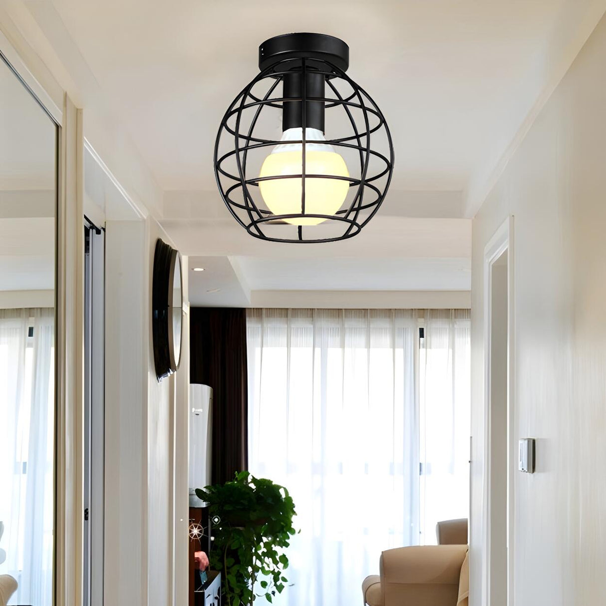 Industrial Aisle Black Globe Cage Flush Mount Light Image - 1