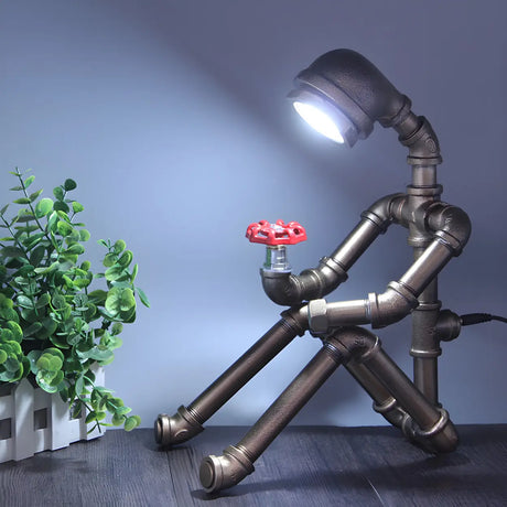 Industrial Chic Sitting Pipe Robot Bedside Table Lamp Image - 1