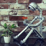 Industrial Chic Sitting Pipe Robot Bedside Table Lamp Image - 3