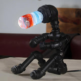 Industrial Colorful Glass Bulb Robot Pipe Table Lamp Image - 1