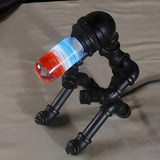 Industrial Colorful Glass Bulb Robot Pipe Table Lamp Image - 3