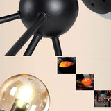 Industrial Tiered Black Metal Glass Globes Chandelier Image - 11