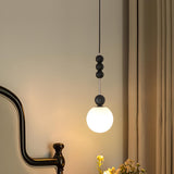 Matte Black Glass Ball Pendant Light Adjustable Height Image - 1