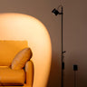 Minimalist Adjustable Black Cylinder Metal Floor Lamp Image - 3