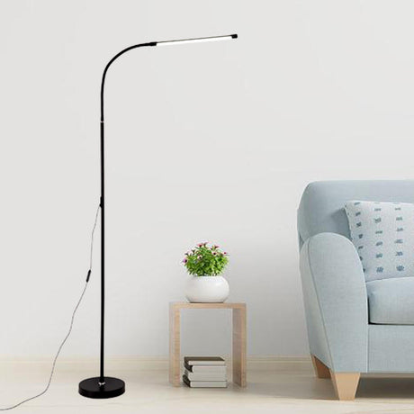 Minimalist Black Arced Linear Metal LED Floor Lamp Image - 1