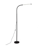 Minimalist Black Arced Linear Metal LED Floor Lamp Image - 4