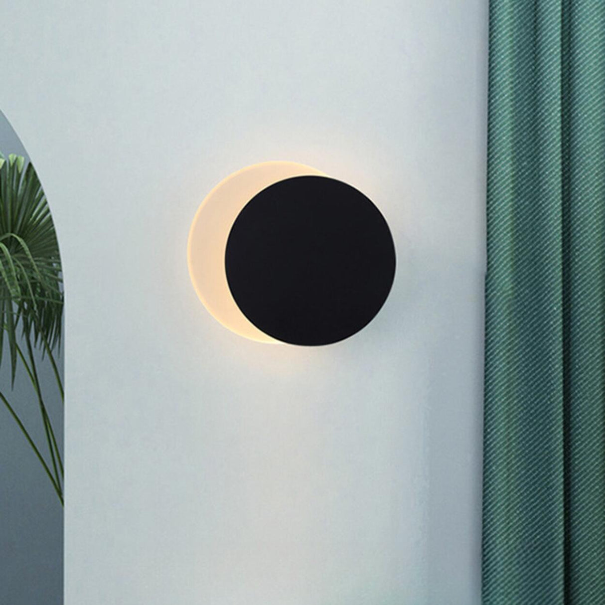 Minimalist Black Circular Metal LED Wall Sconce Image - 1