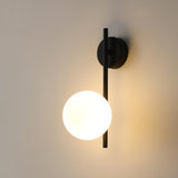 Minimalist Black Circular Metal LED Wall Sconce Image - 9