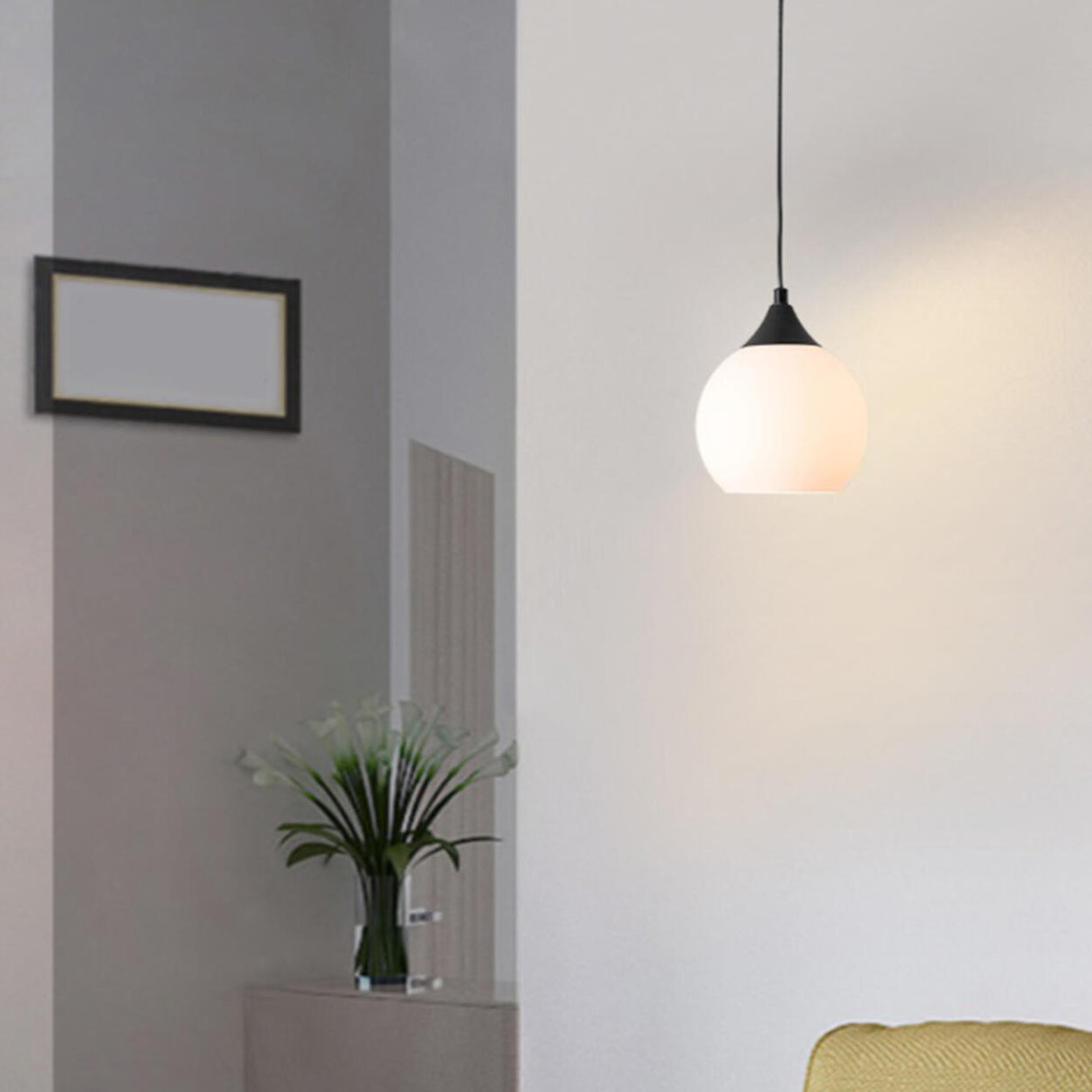 Minimalist Black Metal White Glass Globe Pendant Light Image - 4