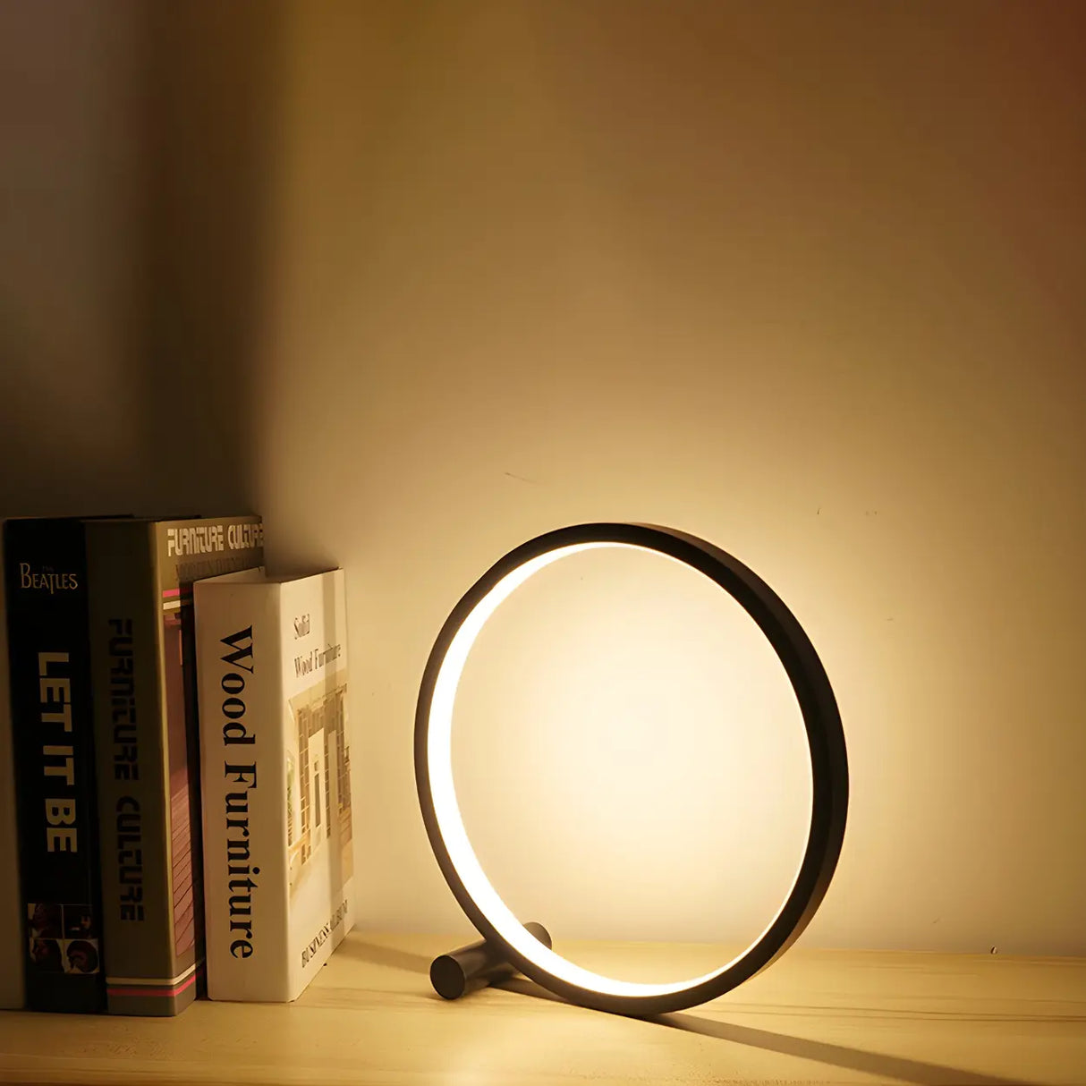 Minimalist Circular Metal Black Ambient Table Lamp Image - 12