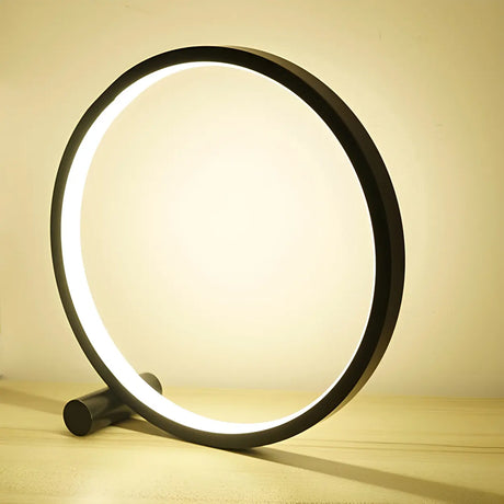 Minimalist Circular Metal Black Ambient Table Lamp Image - 2