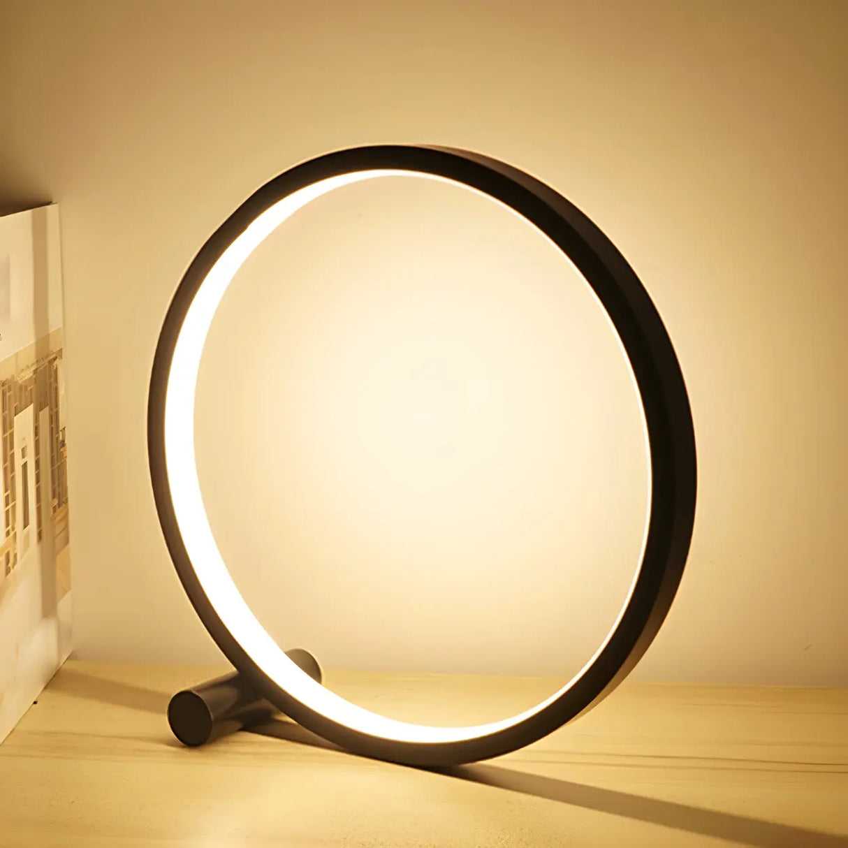 Minimalist Circular Metal Black Ambient Table Lamp Image - 4