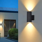 Minimalist Cylinder Black Exterior Up Down Wall Light Image - 1