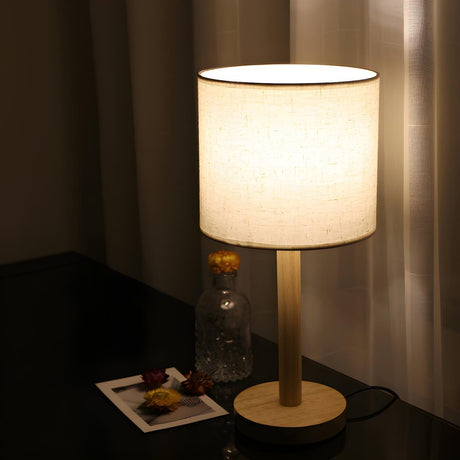 Minimalist Fabric Shade Wood Base Cylinder Table Lamp Image - 1