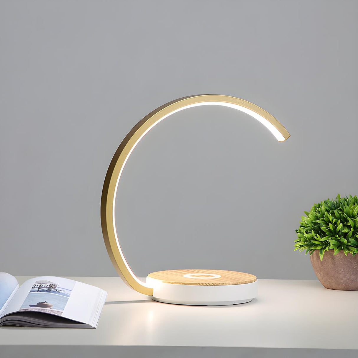 Minimalist Geometric Curved LED Aluminum Table Lamp Image - 1