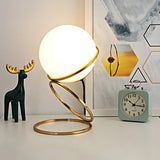 Minimalist Golden Ring Milky Glass Globe Table Lamp Image - 8