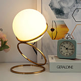 Minimalist Golden Ring Milky Glass Globe Table Lamp Image - 9