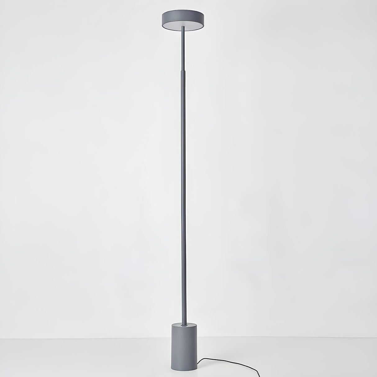 Minimalist LED Cylindrical Base Peak Floor Lamp Image - 9