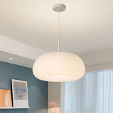 Minimalist Modern LED White Resin Drum Pendant Light Image - 1