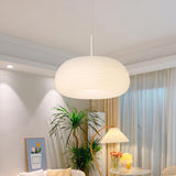 Minimalist Modern LED White Resin Drum Pendant Light Image - 4