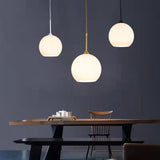 Minimalist Modern Metal White Glass GLobe Pendant Light Image - 1