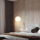 Minimalist Modern Metal White Glass GLobe Pendant Light Image - 4