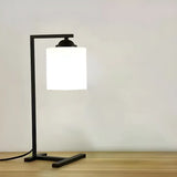 Minimalist White Cylinder Shade Black Base Table Lamp Image - 9