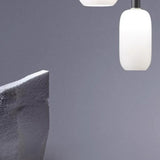 Minimalist White Glass Cylinder Pendant Light Image - 4