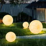 Minimalist White Globe Outdoor Stone Garden Table Lamp Image - 2