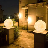 Minimalist White Globe Outdoor Stone Garden Table Lamp Image - 3