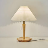 Minimalist White Pleated Shade Wooden Base Table Lamp Image - 9