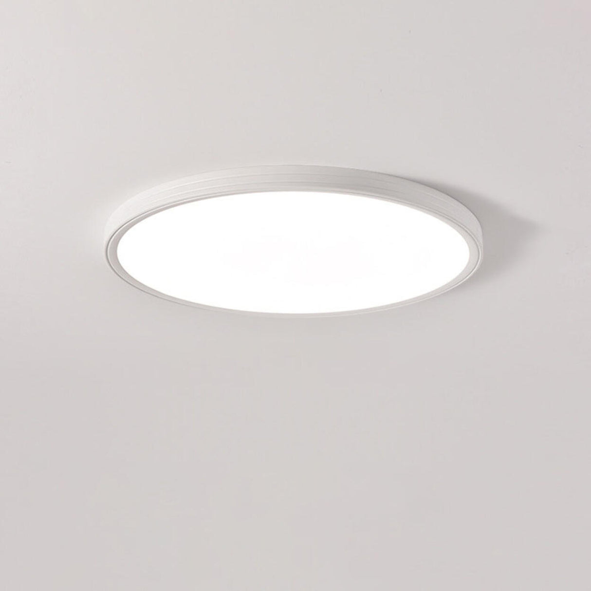 Minimalist White Rectangular LED Flush Mount Fixture Image - 2