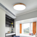 Minimalist White Round Bedroom Flush Mount Light Image - 1