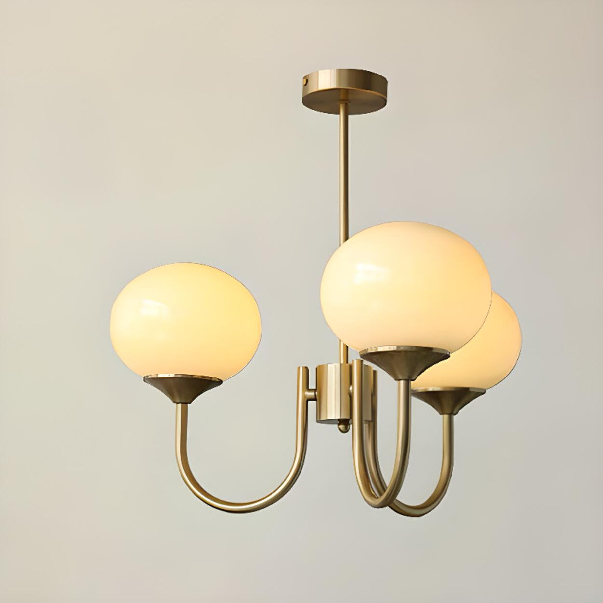 Modern 3-Light Brass Chandelier White Glass Globes Image - 3