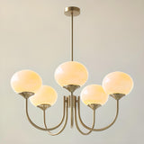 Modern 3-Light Brass Chandelier White Glass Globes Image - 9