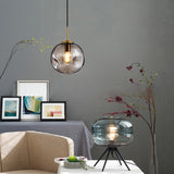 Modern Abstract Brass Clear Glass Globe Pendant Light Image - 2