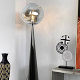 Modern Acrylic Column Black Cone Metal Floor Lamp Image - 6