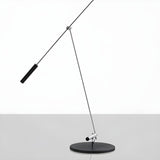 Modern Adjustable Black Disc Metal LED Floor Lamp Image - 4