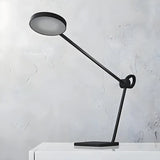 Modern Adjustable Black Metallic Round Table Lamp Image - 4