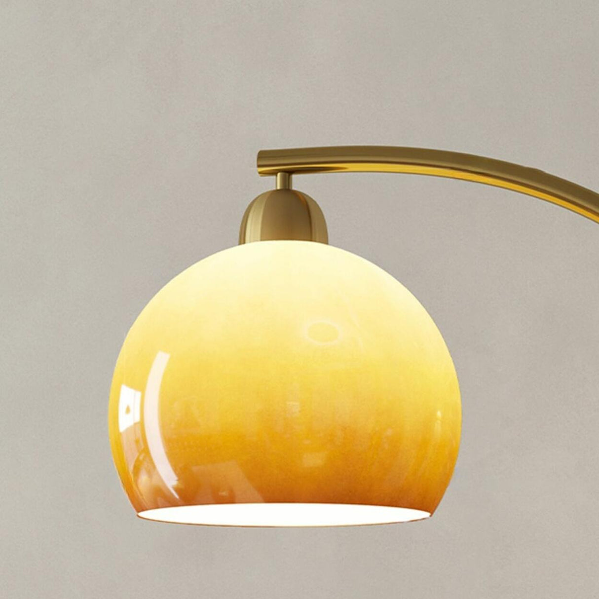 Modern Amber Dome and Curved Gold Metal Floor Lamp Image - 8