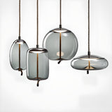 Modern Amber Glass Cylinder Geometric Pendant Light Set Image - 11