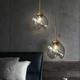 Modern Bedroom Mini Globe Clear Glass Pendant Light Image - 1