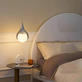 Modern Bedroom White Glass Teardrop Chrome Pendant Light Image - 9